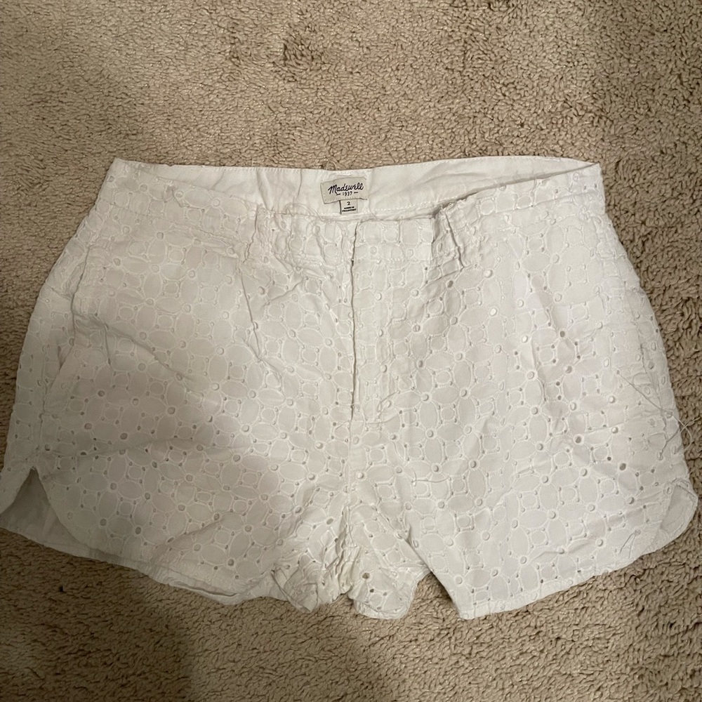 White eyelet Madewell shorts.